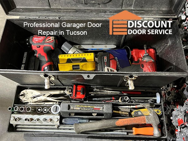 garage door repairman's tool box of tools